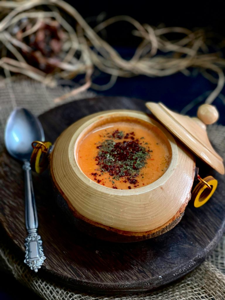 Delicious Turkish lentil soup served in a wooden bowl, perfect for a cozy meal.